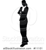 Vector Illustration of a Black and White Silhouetted Business Woman with Folded Arms by AtStockIllustration