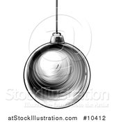 Vector Illustration of a Black and White Vintage Woodcut or Engraved Suspended Christmas Bauble Ornament by AtStockIllustration