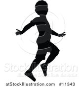 Vector Illustration of a Black Silhouetted Boy Skipping by AtStockIllustration