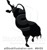 Vector Illustration of a Black Silhouetted Bull Bucking by AtStockIllustration