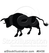 Vector Illustration of a Black Silhouetted Bull Charging by AtStockIllustration