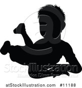 Vector Illustration of a Black Silhouetted Little Boy by AtStockIllustration