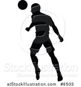 Vector Illustration of a Black Silhouetted Male Soccer Player Athlete in Action by AtStockIllustration