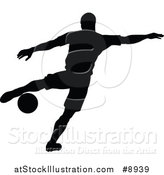 Vector Illustration of a Black Silhouetted Male Soccer Player in Action by AtStockIllustration