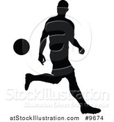 Vector Illustration of a Black Silhouetted Male Soccer Player in Action by AtStockIllustration