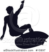 Vector Illustration of a Black Silhouetted Man Surfing by AtStockIllustration