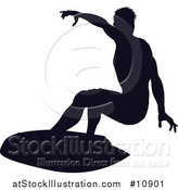 Vector Illustration of a Black Silhouetted Man Surfing by AtStockIllustration