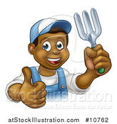 Vector Illustration of a Cartoon Happy Black Male Gardener in Blue, Holding up a Thumb a Garden Fork by AtStockIllustration