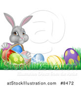 Vector Illustration of a Happy Gray Easter Bunny with a Basket of Eggs and Flowers in the Grass, with White Text Space by AtStockIllustration