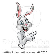 Vector Illustration of a Happy White Bunny Rabbit Pointing Around a Sign by AtStockIllustration