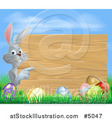 Vector Illustration of a Wood Sign Easter Bunny with Eggs Grass and Sky by AtStockIllustration