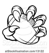 Vector Illustration of Black and White Monster Claw Holding a Football by AtStockIllustration