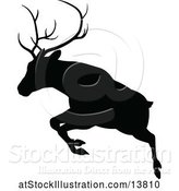 Vector Illustration of Black Silhouetted Deer Stag Buck Leaping by AtStockIllustration