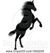 Vector Illustration of Black Silhouetted Horse Rearing by AtStockIllustration