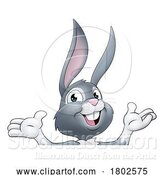 Vector Illustration of Easter Bunny Rabbit Character Peeking Sign by AtStockIllustration