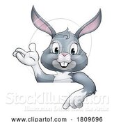 Vector Illustration of Easter Bunny Rabbit Character Peeking Sign by AtStockIllustration