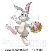 Vector Illustration of Easter Bunny Rabbit with Eggs Basket by AtStockIllustration