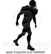 Vector Illustration of Silhouetted Football Player by AtStockIllustration