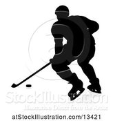 Vector Illustration of Silhouetted Hockey Player, with a Reflection or Shadow by AtStockIllustration