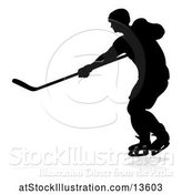 Vector Illustration of Silhouetted Hockey Player, with a Reflection or Shadow by AtStockIllustration