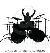 Vector Illustration of Silhouetted Male Drummer by AtStockIllustration