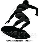 Vector Illustration of Surfer Silhouette by AtStockIllustration