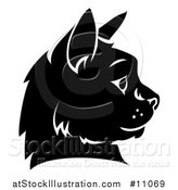 Vector Illustration of a Black and White Cat Face in Profile by AtStockIllustration