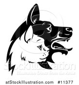 Vector Illustration of a Black and White Profiled Dog and Cat Faces by AtStockIllustration