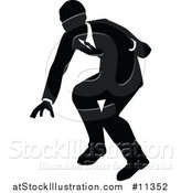 Vector Illustration of a Black and White Silhouetted Business Man by AtStockIllustration