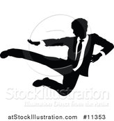 Vector Illustration of a Black and White Silhouetted Business Man Kicking by AtStockIllustration