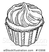 Vector Illustration of a Black and White Vintage Engraved Cupcake by AtStockIllustration