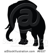 Vector Illustration of a Black Silhouetted Elephant by AtStockIllustration