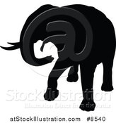 Vector Illustration of a Black Silhouetted Elephant by AtStockIllustration