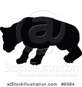 Vector Illustration of a Black Silhouetted Lioness by AtStockIllustration