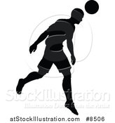 Vector Illustration of a Black Silhouetted Male Soccer Player Athlete in Action by AtStockIllustration