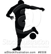 Vector Illustration of a Black Silhouetted Male Soccer Player Athlete in Action by AtStockIllustration