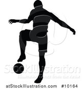 Vector Illustration of a Black Silhouetted Male Soccer Player in Action by AtStockIllustration