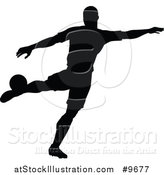 Vector Illustration of a Black Silhouetted Male Soccer Player in Action by AtStockIllustration