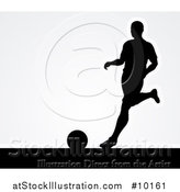 Vector Illustration of a Black Silhouetted Male Soccer Player Kicking over Gray by AtStockIllustration