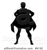 Vector Illustration of a Black Silhouetted Male Super Hero Standing with Hands on His Hips by AtStockIllustration