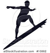 Vector Illustration of a Black Silhouetted Man Surfing by AtStockIllustration