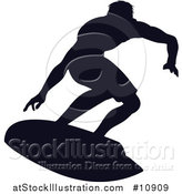 Vector Illustration of a Black Silhouetted Man Surfing by AtStockIllustration