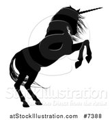 Vector Illustration of a Black Silhouetted Rearing Unicorn in Profile, Facing Right by AtStockIllustration