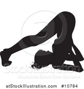 Vector Illustration of a Black Silhouetted Woman in a Yoga Pose by AtStockIllustration