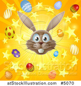 Vector Illustration of a Burst of Rays Stars Eggs and a Gray Easter Bunny by AtStockIllustration
