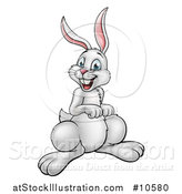 Vector Illustration of a Cartoon Happy White Easter Bunny Rabbit by AtStockIllustration