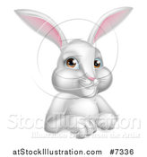 Vector Illustration of a Cartoon Happy White Rabbit over a Sign by AtStockIllustration