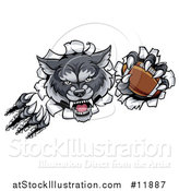 Vector Illustration of a Ferocious Gray Wolf Slashing Through a Wall with a Football by AtStockIllustration