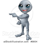 Vector Illustration of a Friendly Gray Alien Pointing to the Left by AtStockIllustration