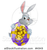 Vector Illustration of a Gray Bunny Rabbit Holding an Easter Egg by AtStockIllustration